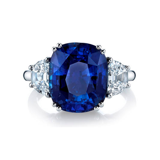 Oval Blue Sapphire with Trapezoid Diamond Side Stones Ring