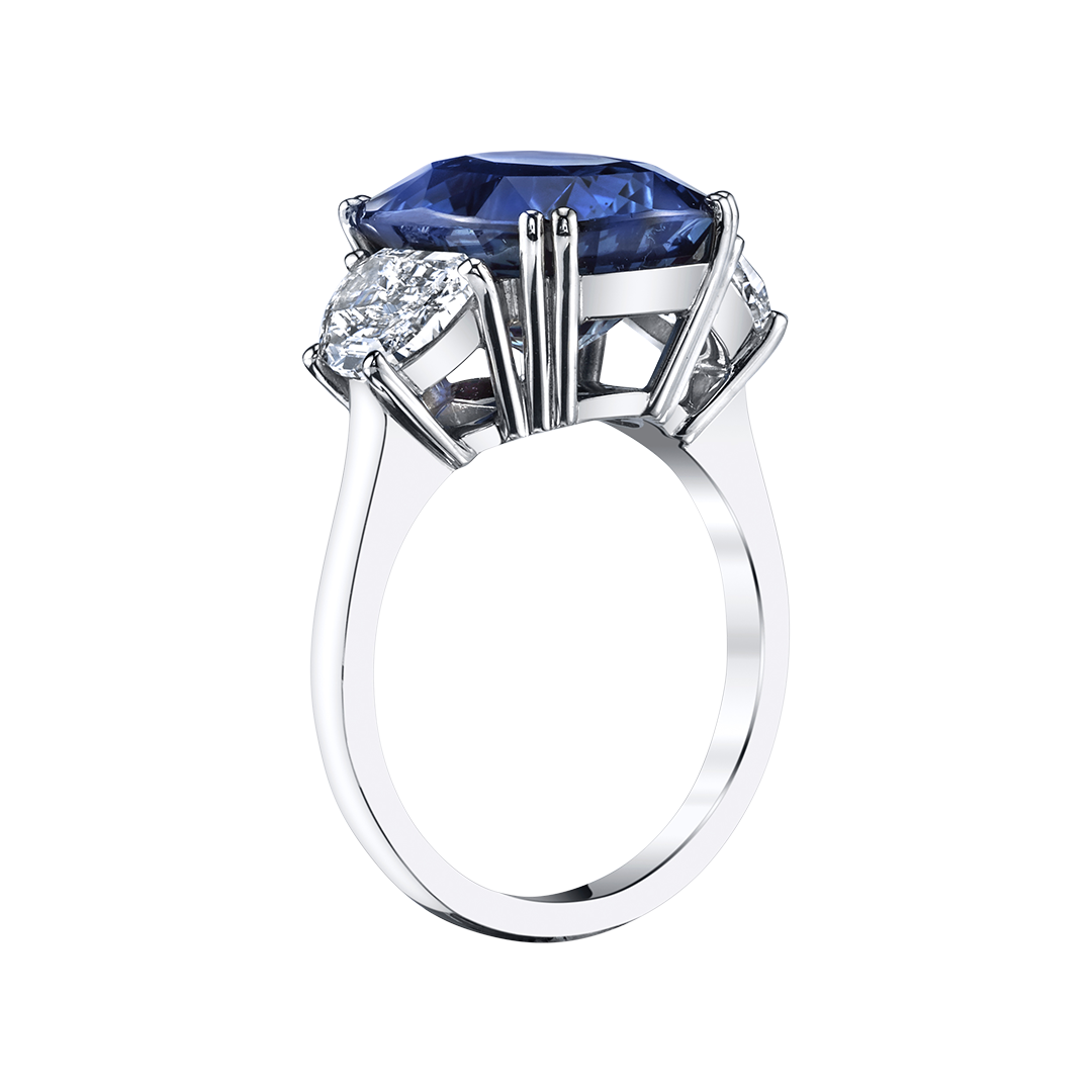 Oval Blue Sapphire with Trapezoid Diamond Side Stones Ring