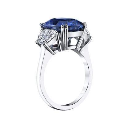 Oval Blue Sapphire with Trapezoid Diamond Side Stones Ring