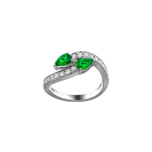 18kt white gold .90ctw emerald and (.42ctw) diamond bypass ring